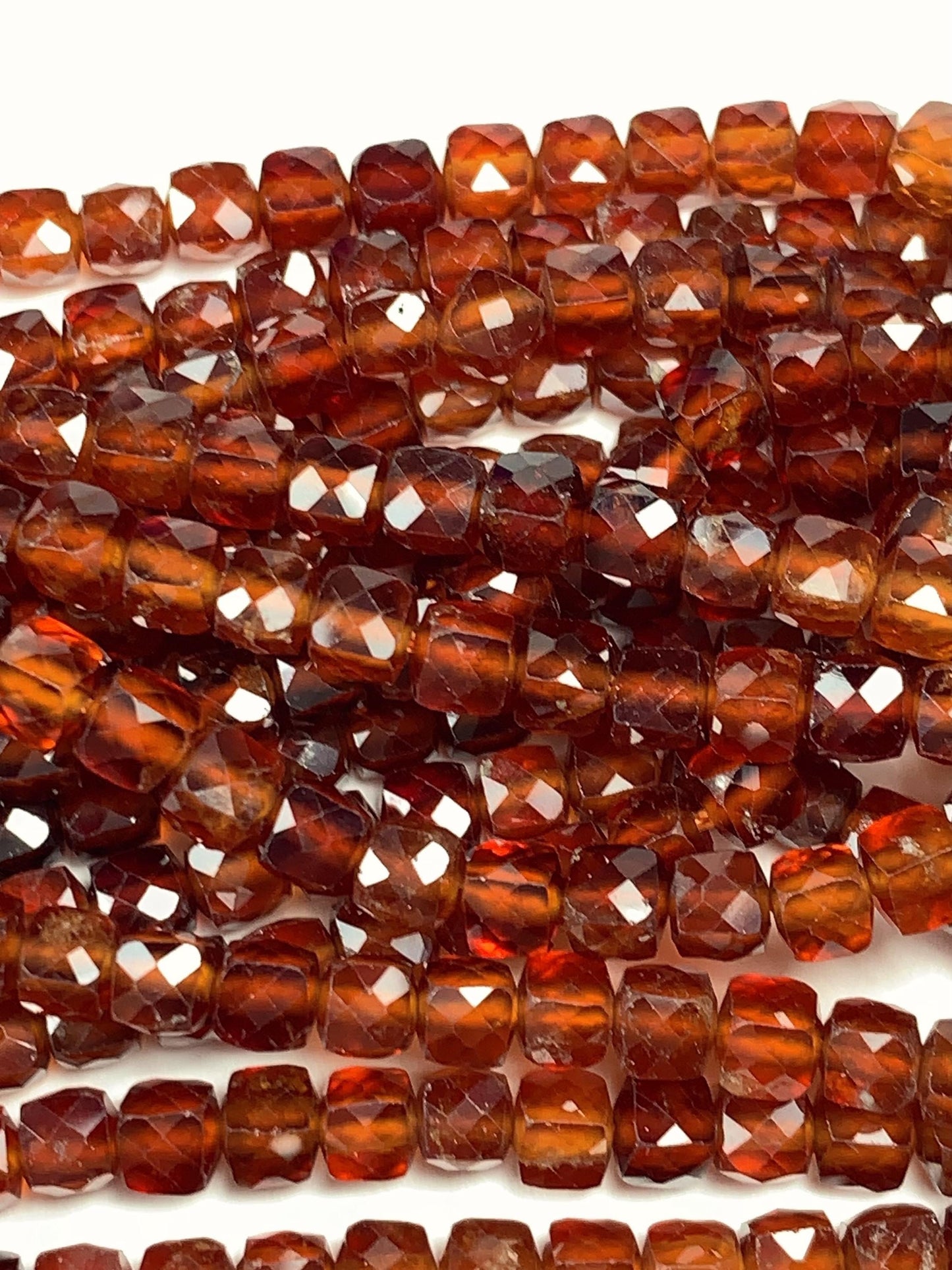 AAA+ Natural Hessonite Garnet Beads: Deep Orange Faceted Cube, 2-4mm Strand