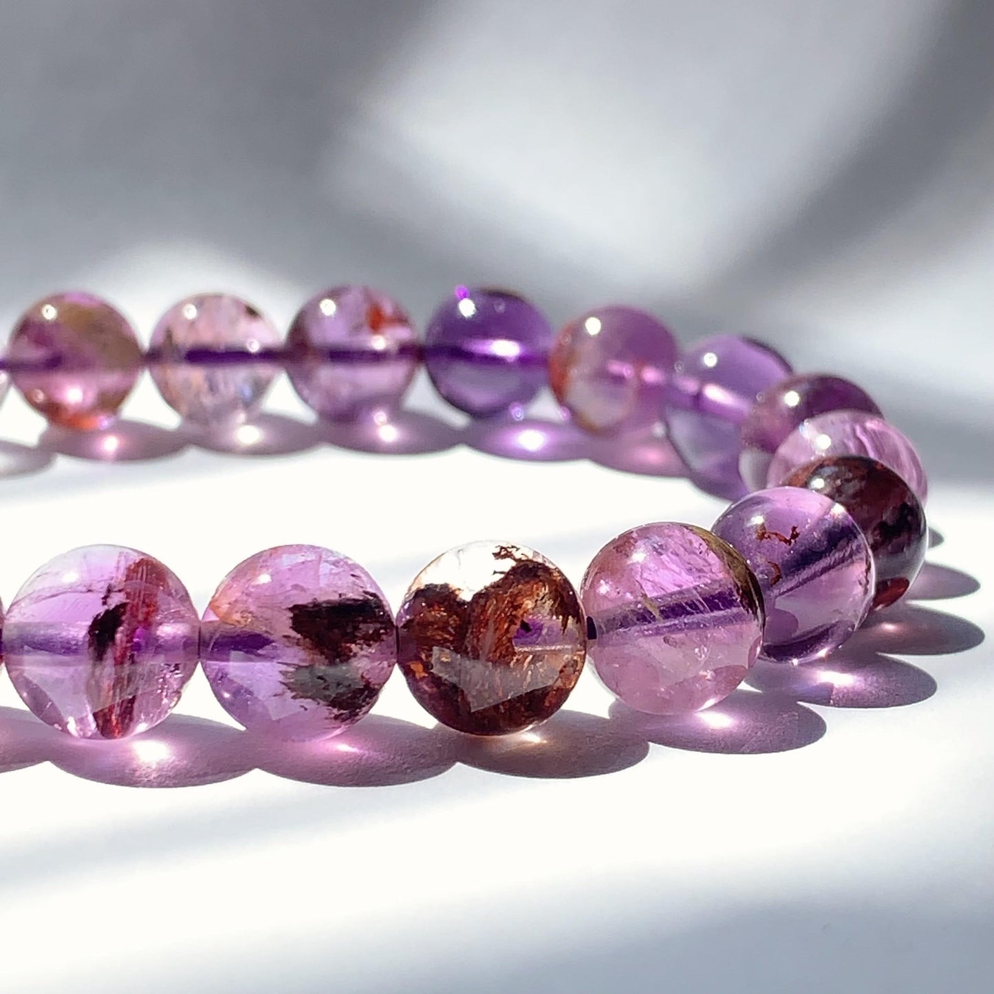 Super 7 Crystal Bracelet: Natural Amethyst Cacoxenite Quartz, Purple Brown Gemstone