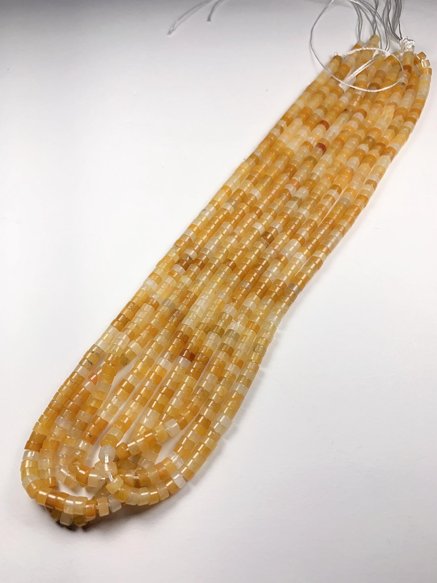 2x4mm oily luster with a hint of translucency Honey Yellow Jade Heishi Disc Beads 15" Strand