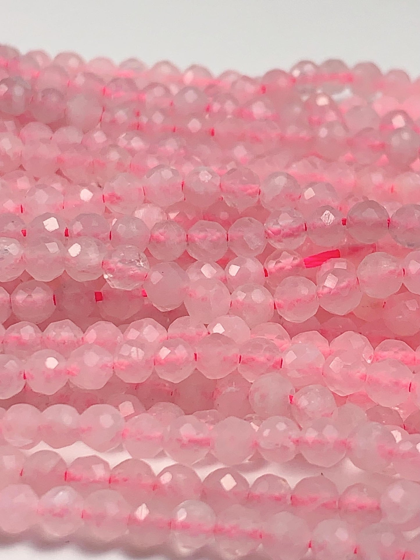 AAA Natural Cream Pink Rose Quartz Faceted Round Beads Gemstone Strand (15.5")