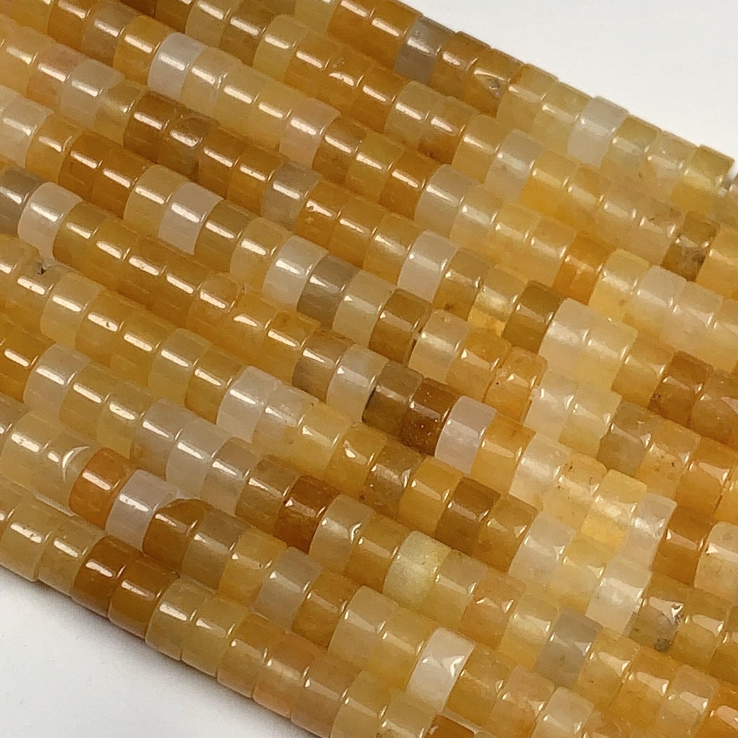 2x4mm oily luster with a hint of translucency Honey Yellow Jade Heishi Disc Beads 15" Strand