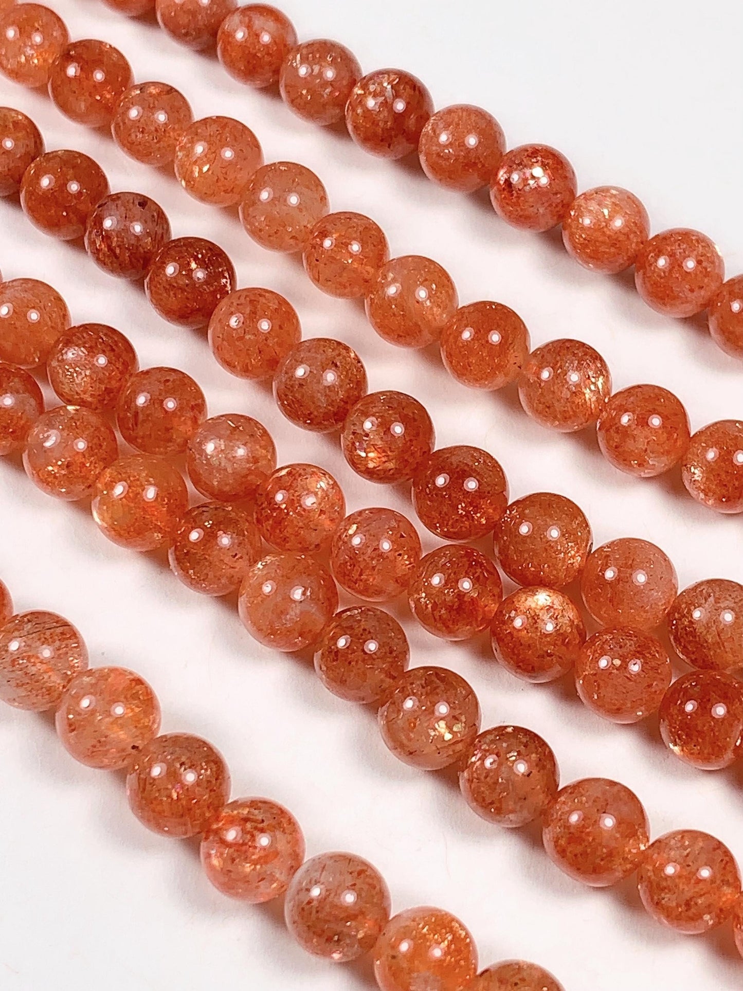 6mm AAA Golden Orange Sunstone Smooth Round Beads: 15.5" Strand