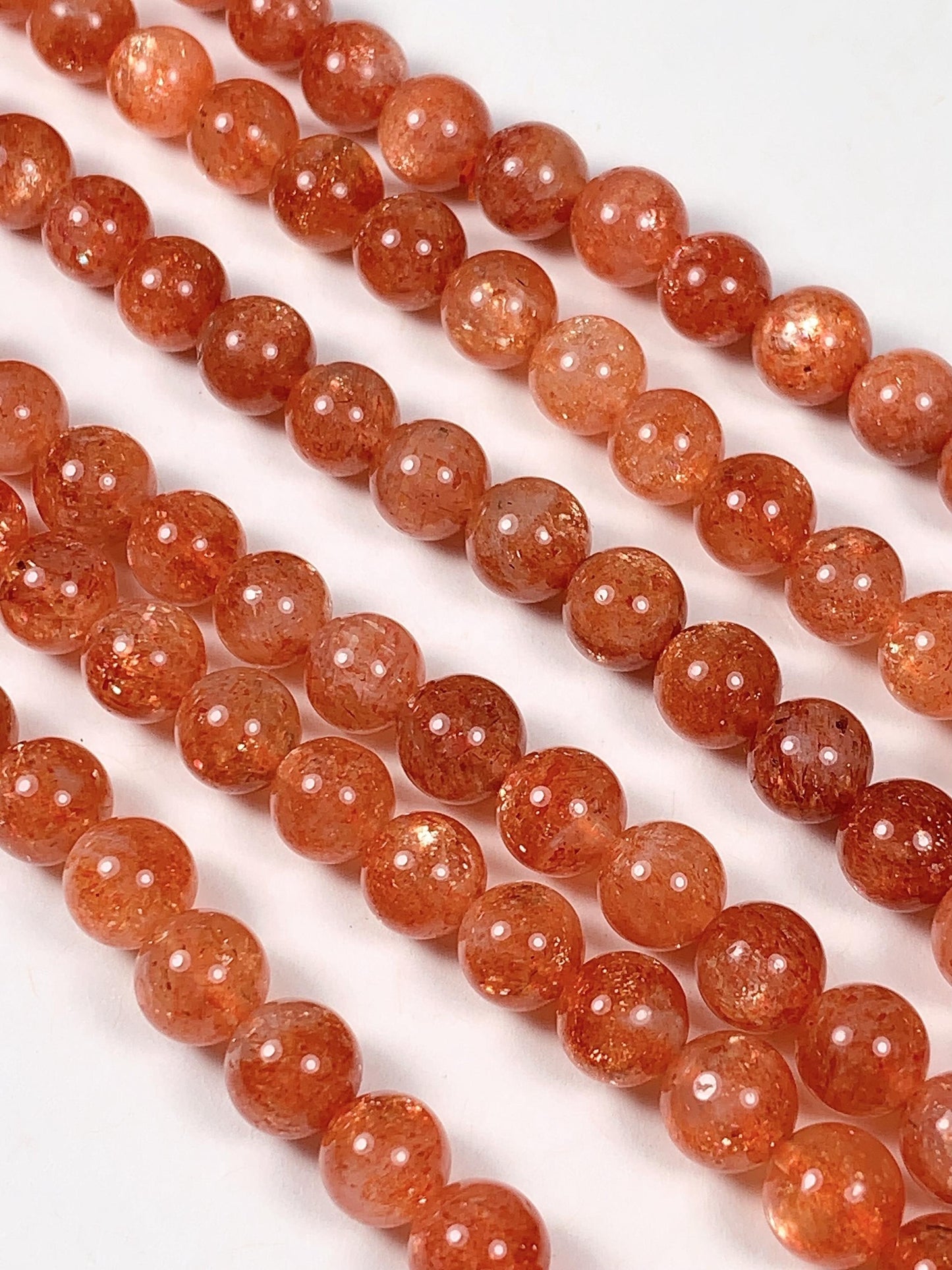 6mm AAA Golden Orange Sunstone Smooth Round Beads: 15.5" Strand