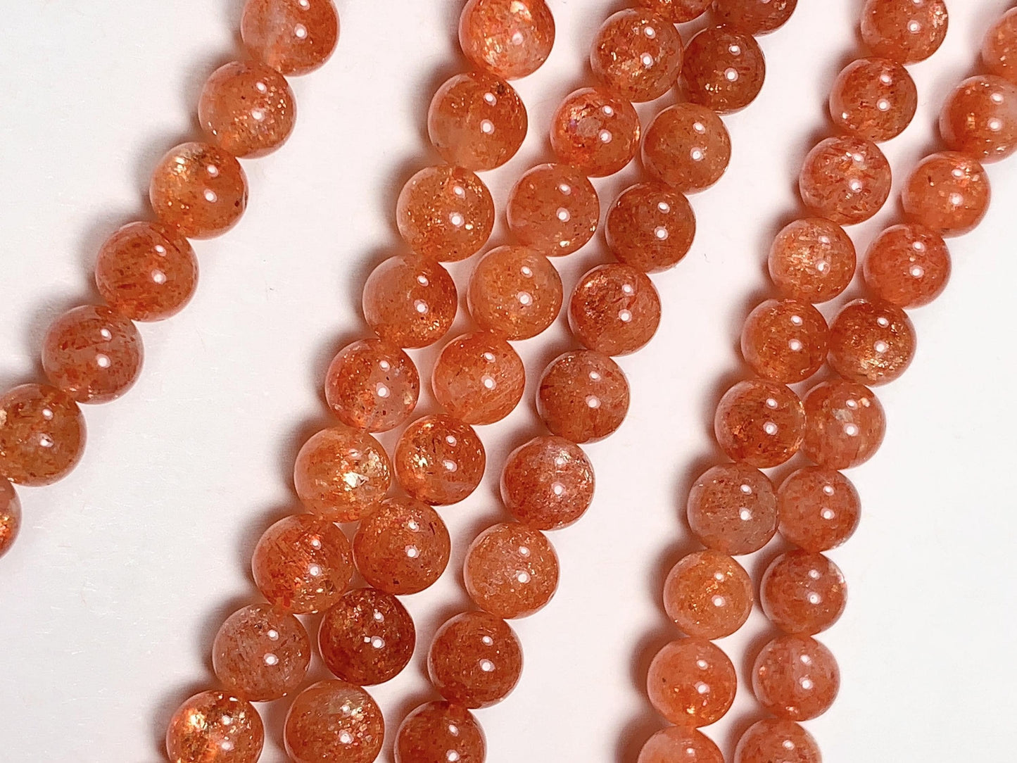6mm AAA Golden Orange Sunstone Smooth Round Beads: 15.5" Strand