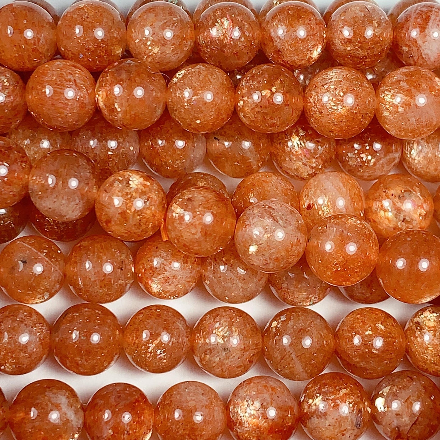6mm AAA Golden Orange Sunstone Smooth Round Beads: 15.5" Strand