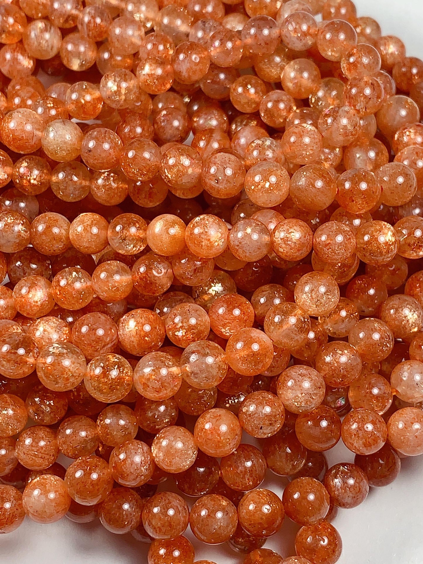 6mm AAA Golden Orange Sunstone Smooth Round Beads: 15.5" Strand