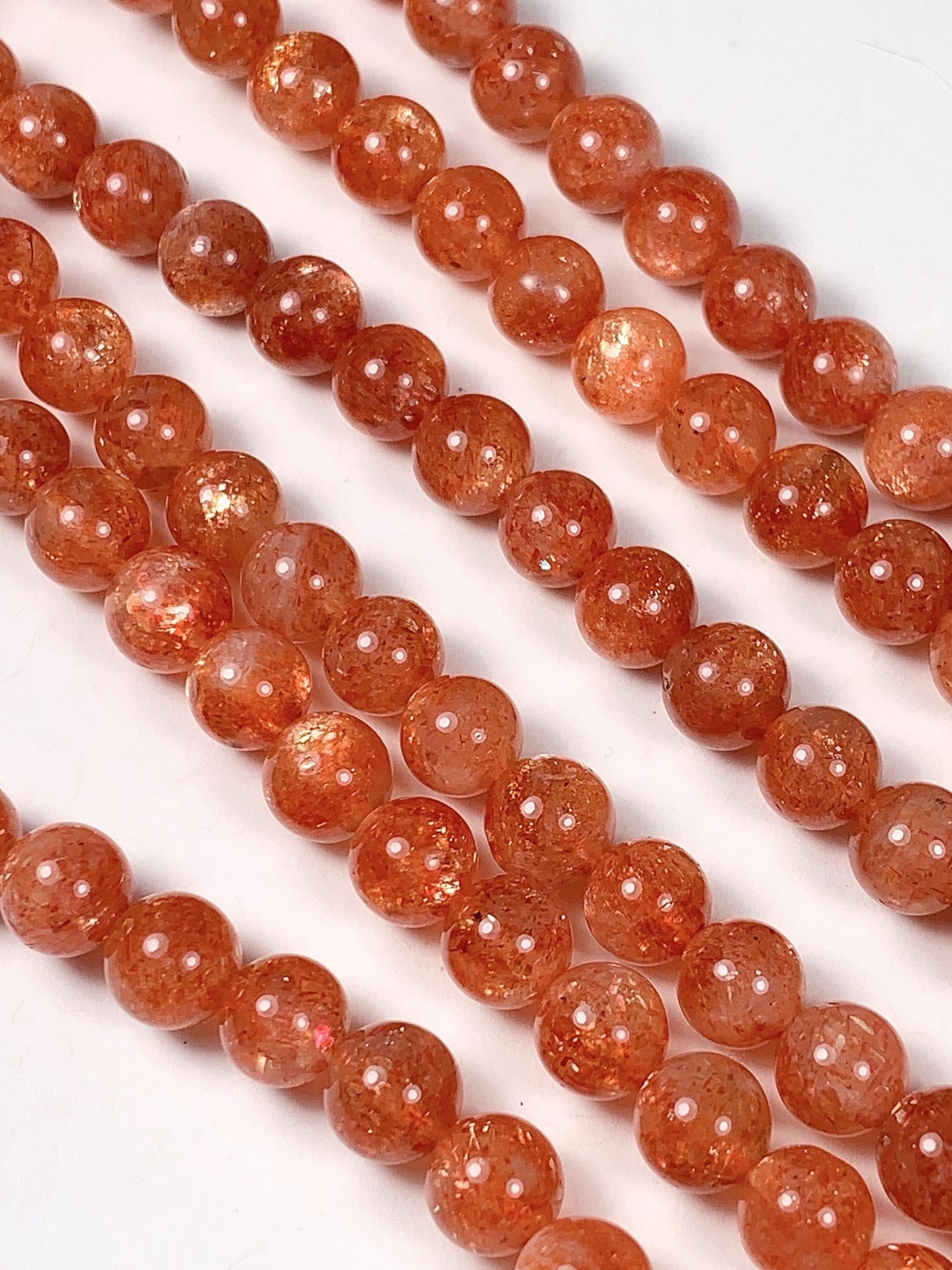 6mm AAA Golden Orange Sunstone Smooth Round Beads: 15.5" Strand