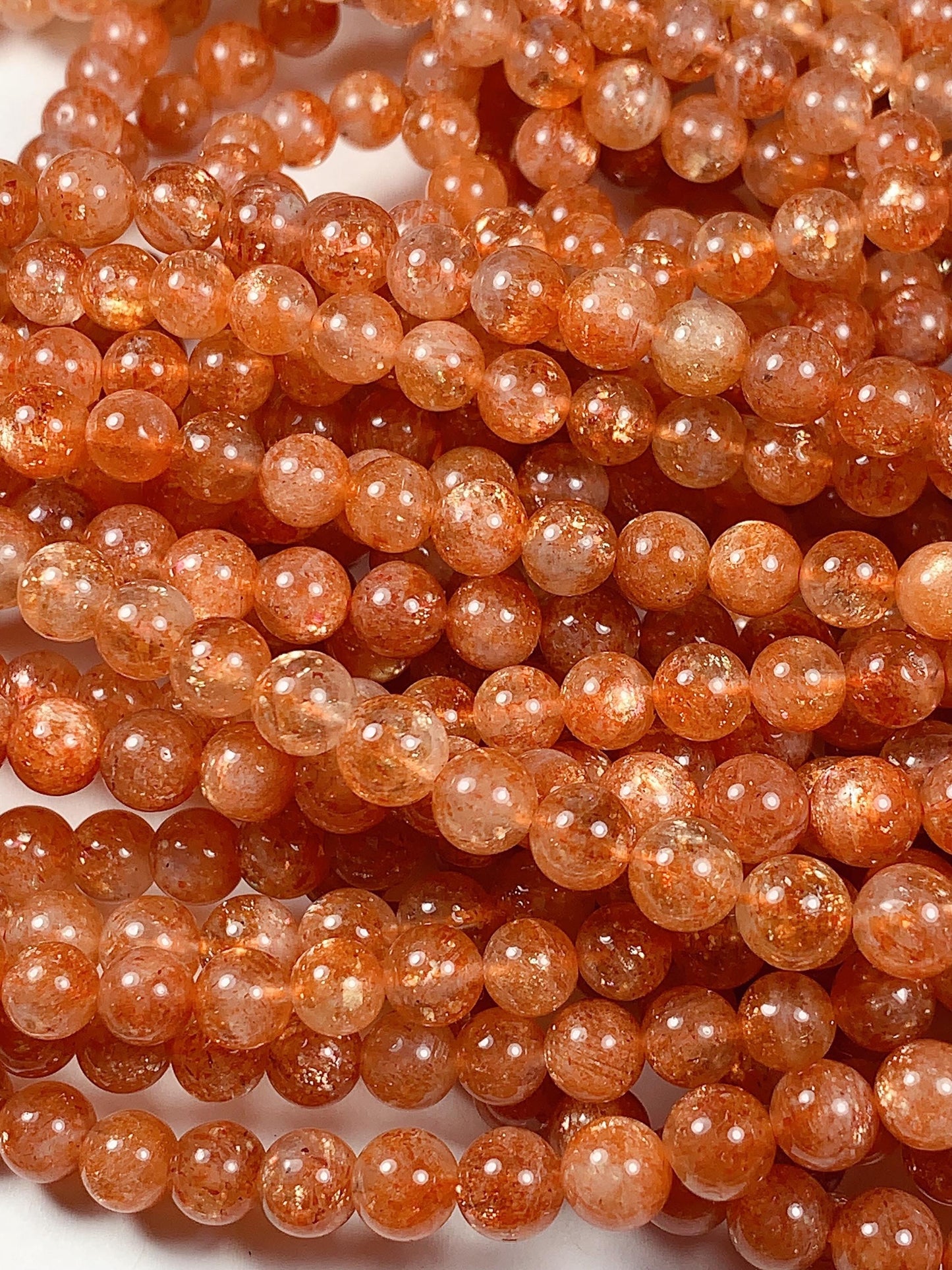 6mm AAA Golden Orange Sunstone Smooth Round Beads: 15.5" Strand