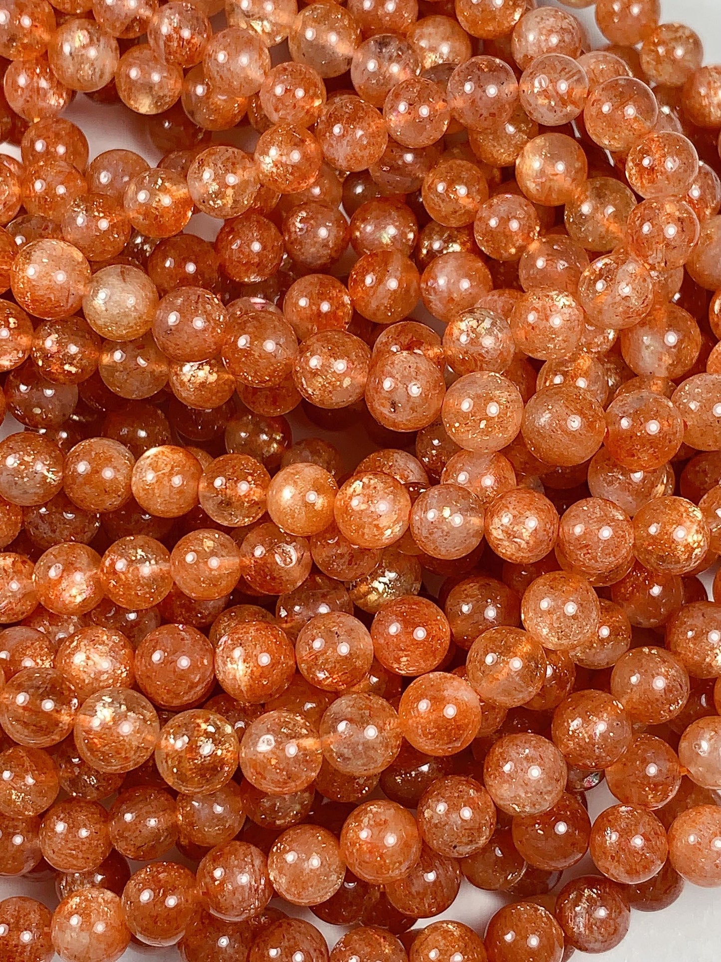 6mm AAA Golden Orange Sunstone Smooth Round Beads: 15.5" Strand