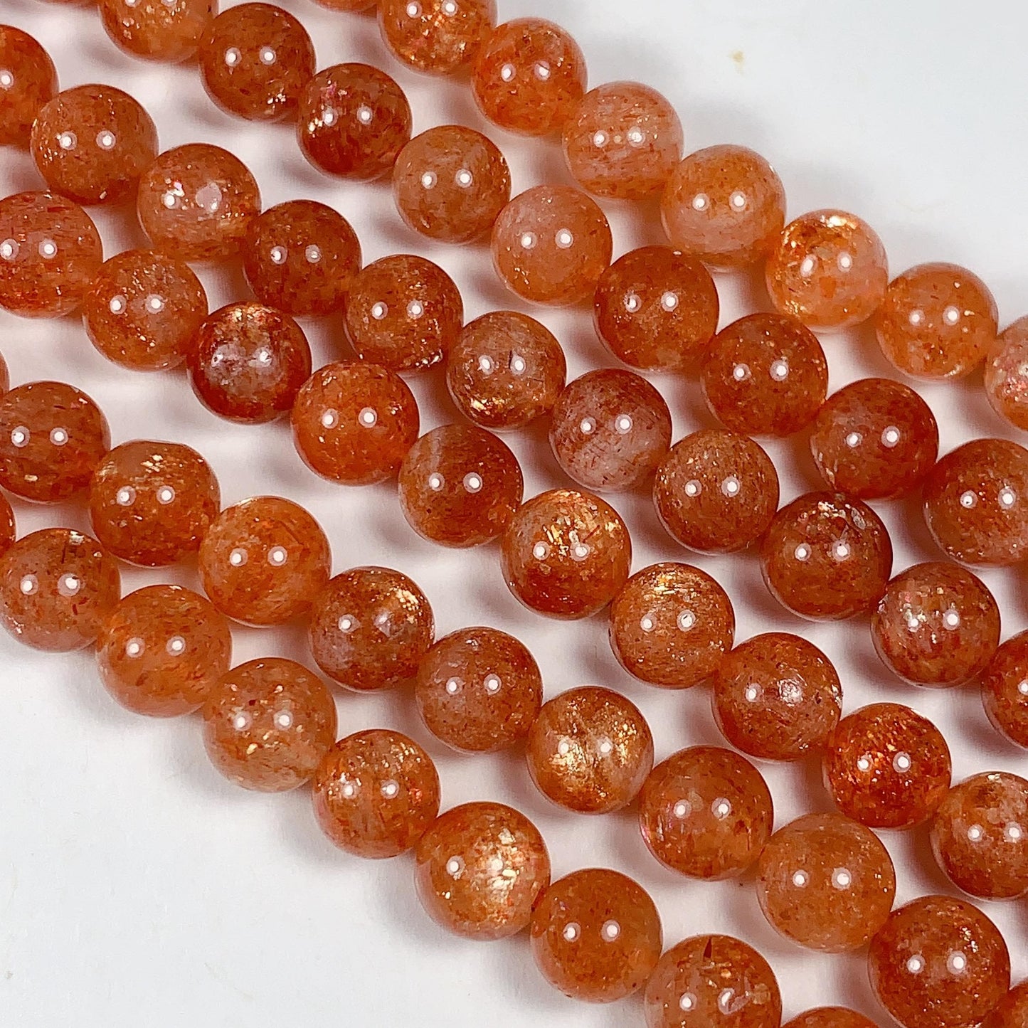 6mm AAA Golden Orange Sunstone Smooth Round Beads: 15.5" Strand