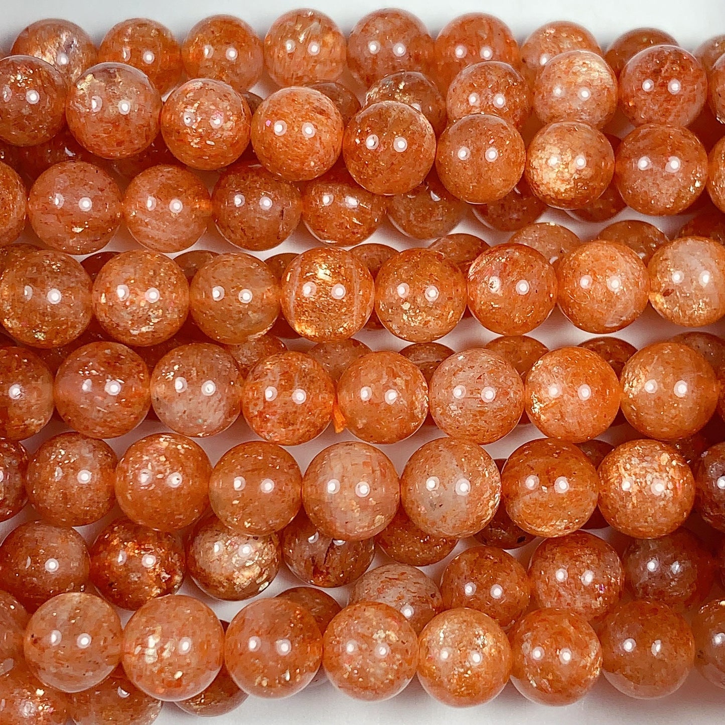 6mm AAA Golden Orange Sunstone Smooth Round Beads: 15.5" Strand