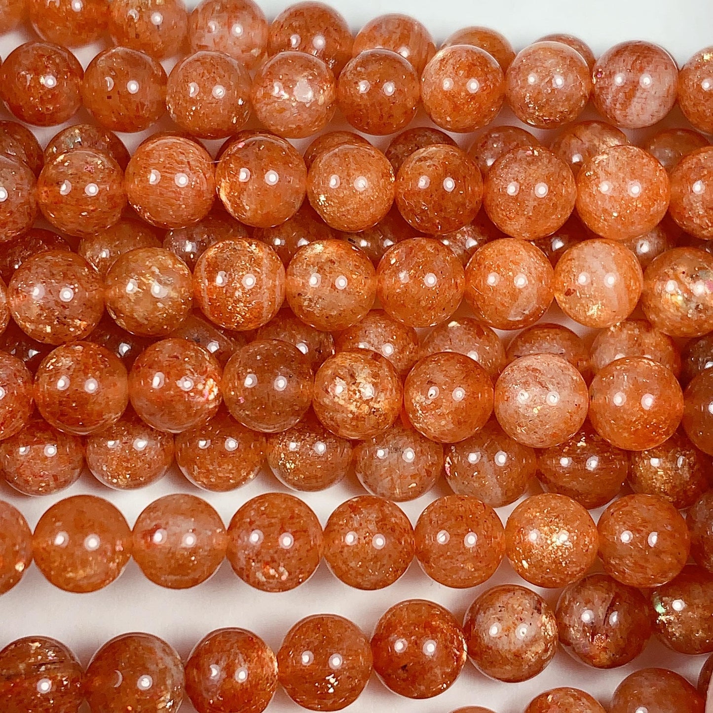 6mm AAA Golden Orange Sunstone Smooth Round Beads: 15.5" Strand
