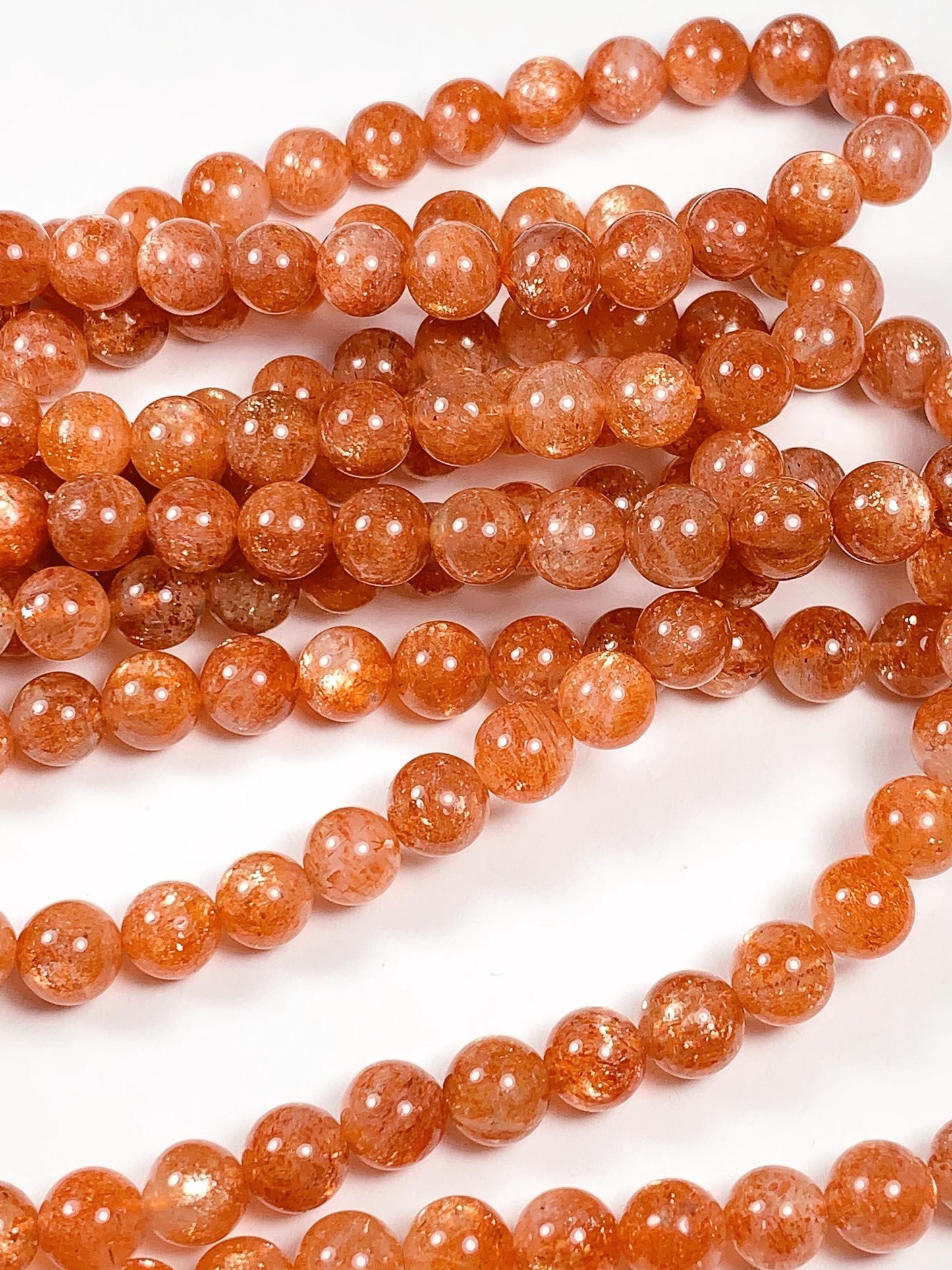 6mm AAA Golden Orange Sunstone Smooth Round Beads: 15.5" Strand
