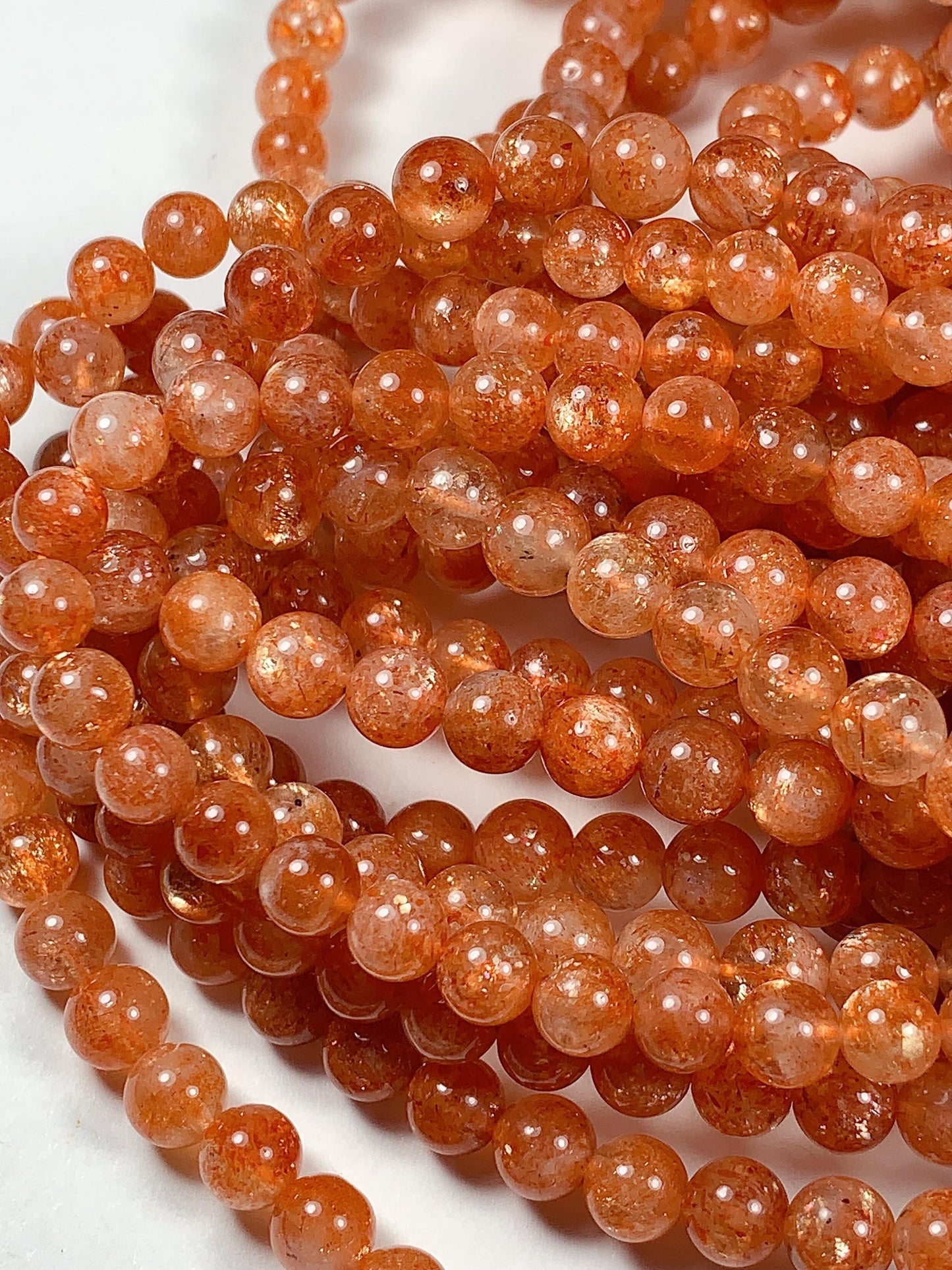 6mm AAA Golden Orange Sunstone Smooth Round Beads: 15.5" Strand