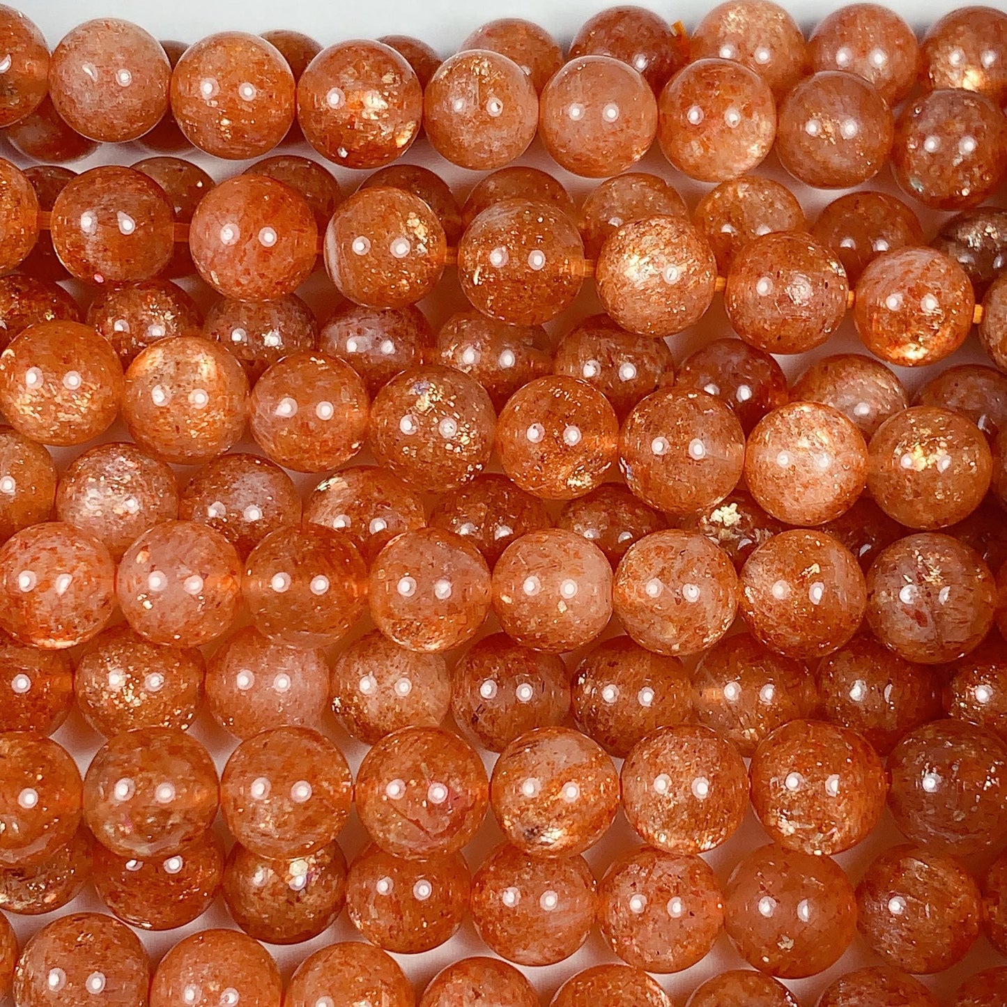 6mm AAA Golden Orange Sunstone Smooth Round Beads: 15.5" Strand