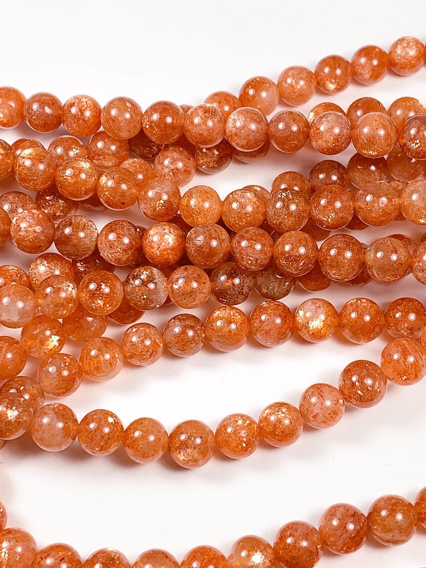 6mm AAA Golden Orange Sunstone Smooth Round Beads: 15.5" Strand