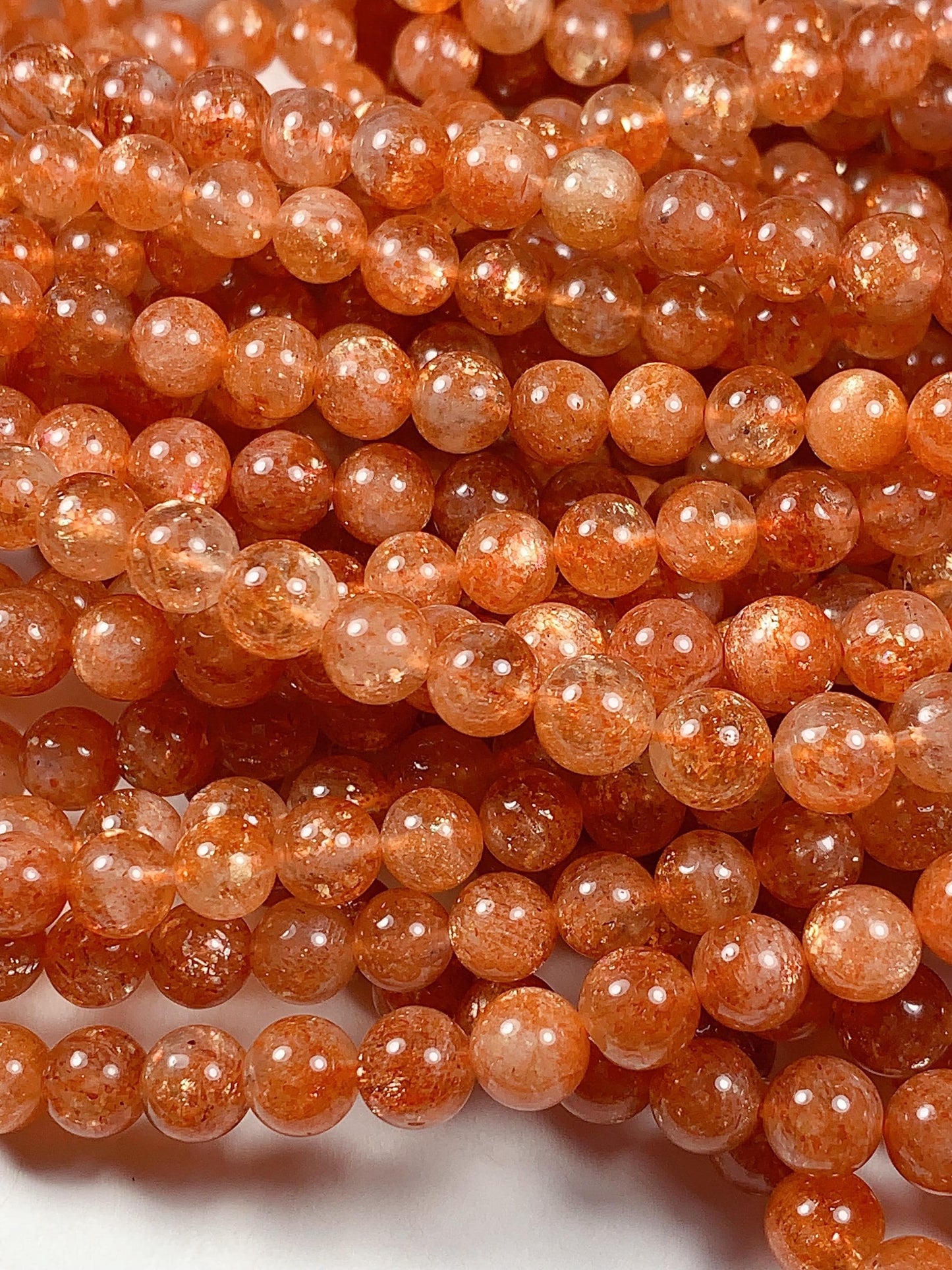6mm AAA Golden Orange Sunstone Smooth Round Beads: 15.5" Strand