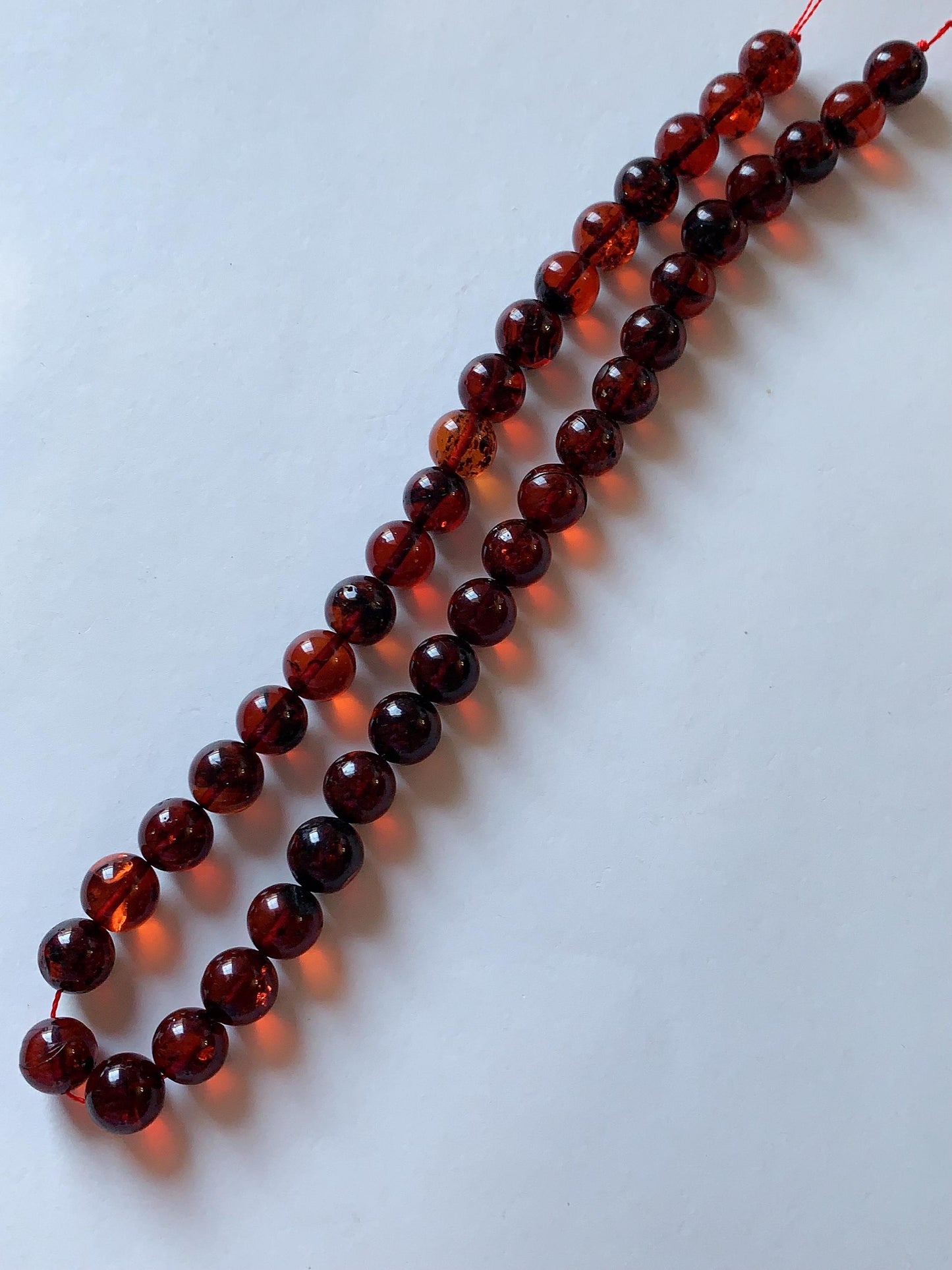High Quality Natural Transparent Baltic Deep Red Amber Smooth Round Beads: 15.5 Strand Gemstone